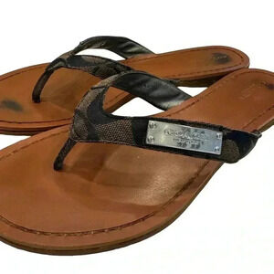 Coach signature logo leather & canvas with silver metal logo flip flops size 7